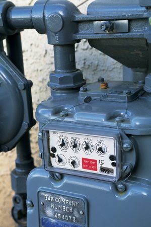 A gas meter located outside of a house