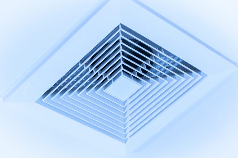 photo of an air vent mounted on the ceiling 